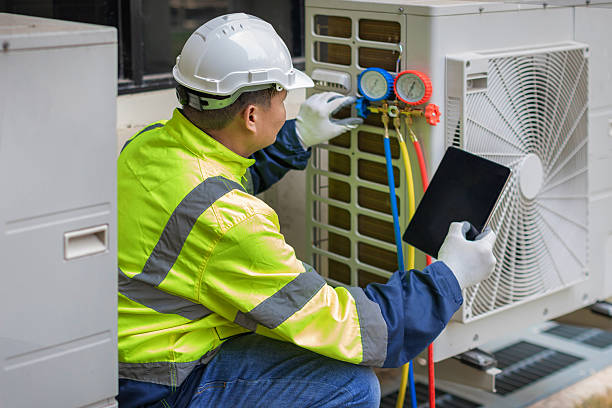 Professional Ac Installation technician working in East Walpole, MA